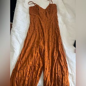 Free People bronze/orange dotted jumpsuit size S NWT